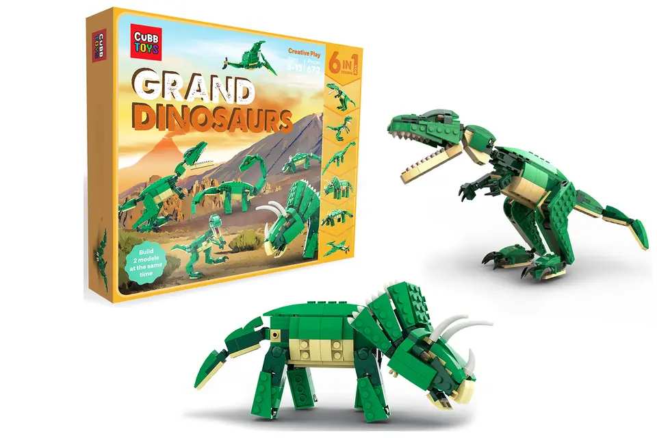 Škatla Grand Dinosaurs 6 v 1, ob njej T-rex in triceratops iz njenih kock